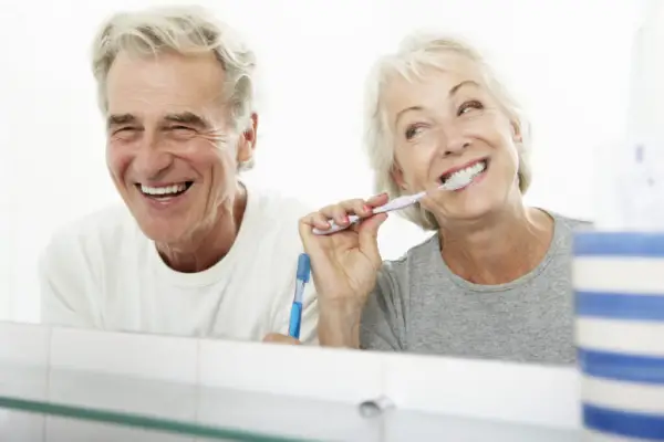 Happy elderly lady and gentleman